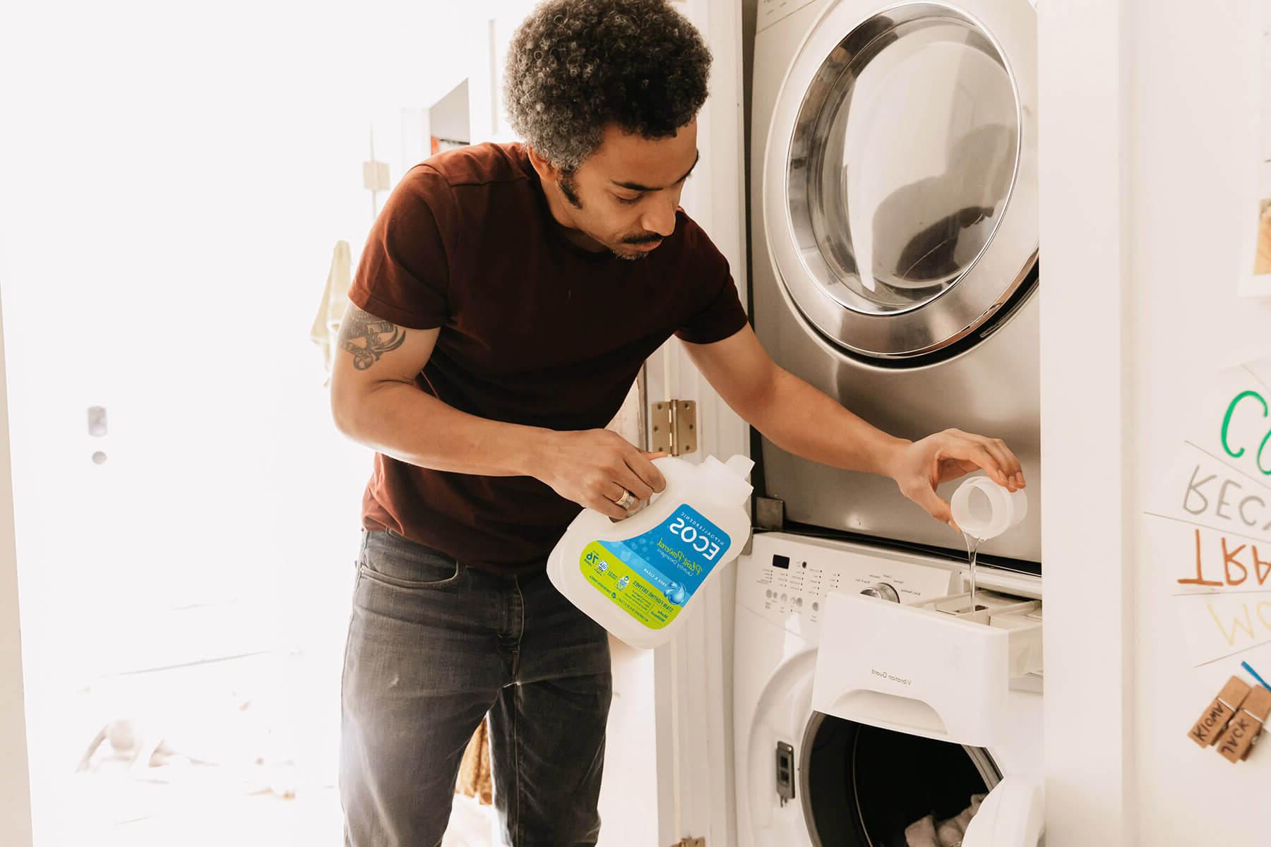 Man using ECOS laundry detergent