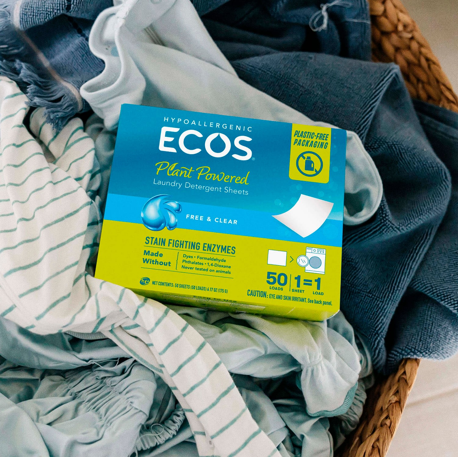 ECOS laundry detergent sheets in basket of laundry
