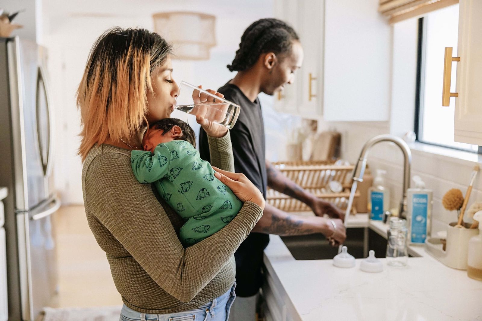 Mother with Baby Drinking Water