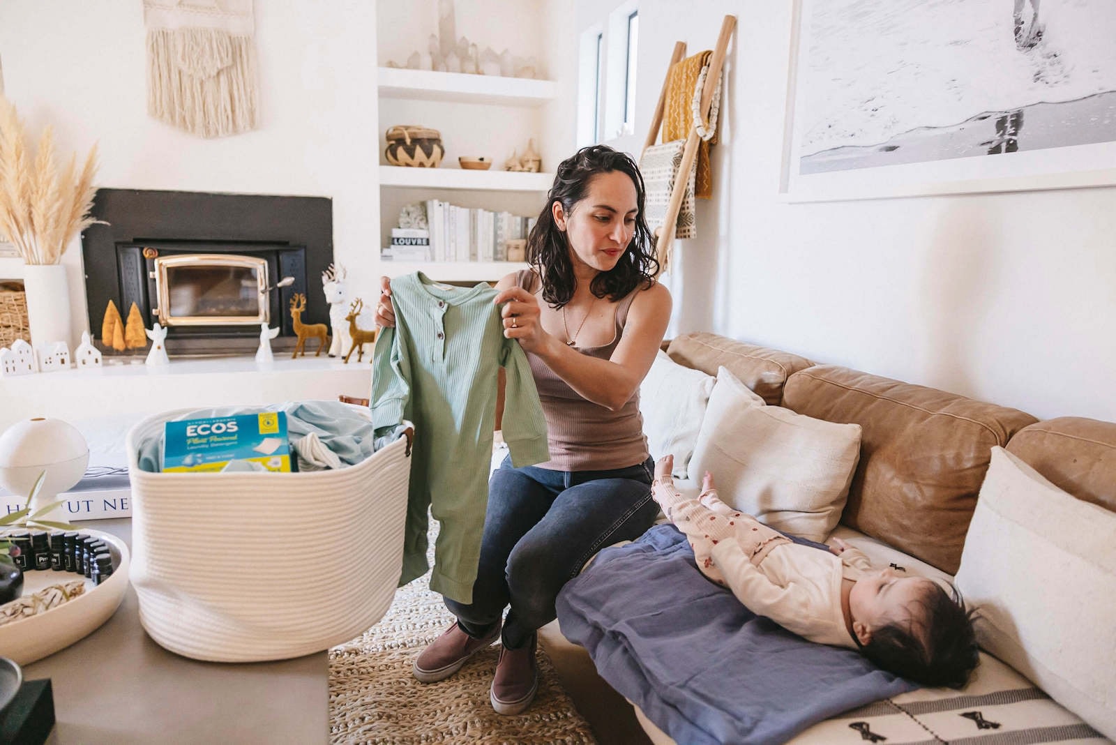 Mom Folding Laundry Baby on Couch