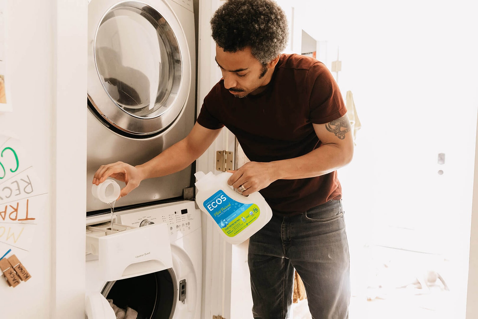Man using ECOS laundry detergent